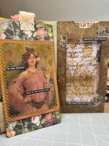 Vintage Portrait Journal - Detail Folio Page Handmade junk journal spread with vintage female portrait, floral collage and stitched details, Golden Spine Studio.